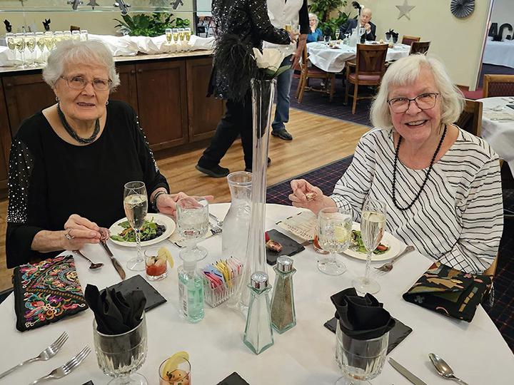 Seniors having dinner together