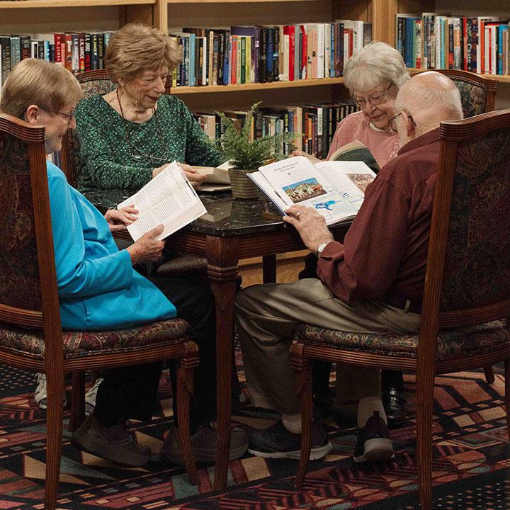 Seniors reading books