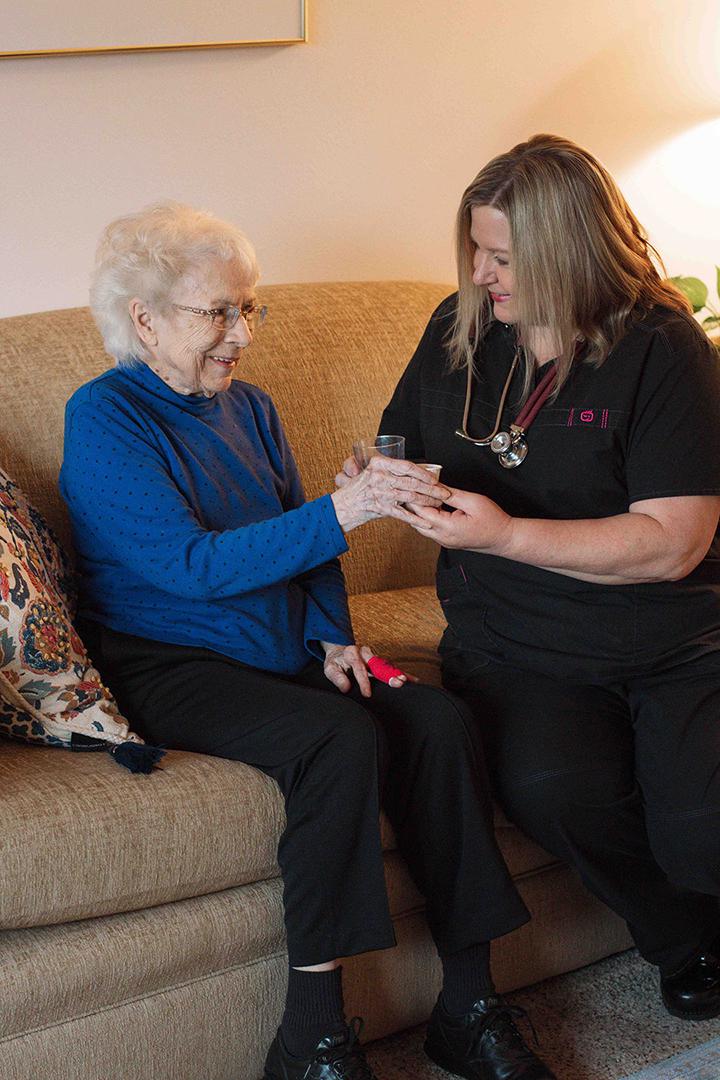 Nurse providing medication